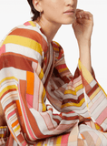 printed top in orange and yellow