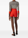 Knit fabric top with a mix of stripes