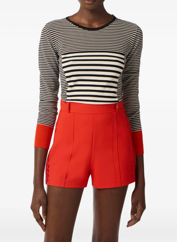 Knit fabric top with a mix of stripes