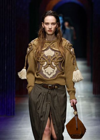 Ribbed wool sweater with tassels and embroidery