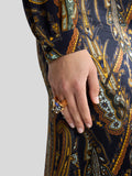 Ring with appliqués
